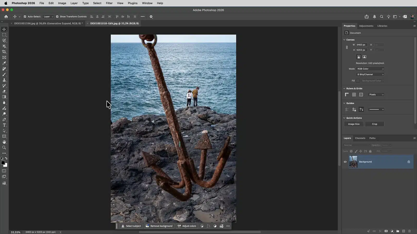 Staande foto van een roestig anker op de rotsen in Gran Canaria